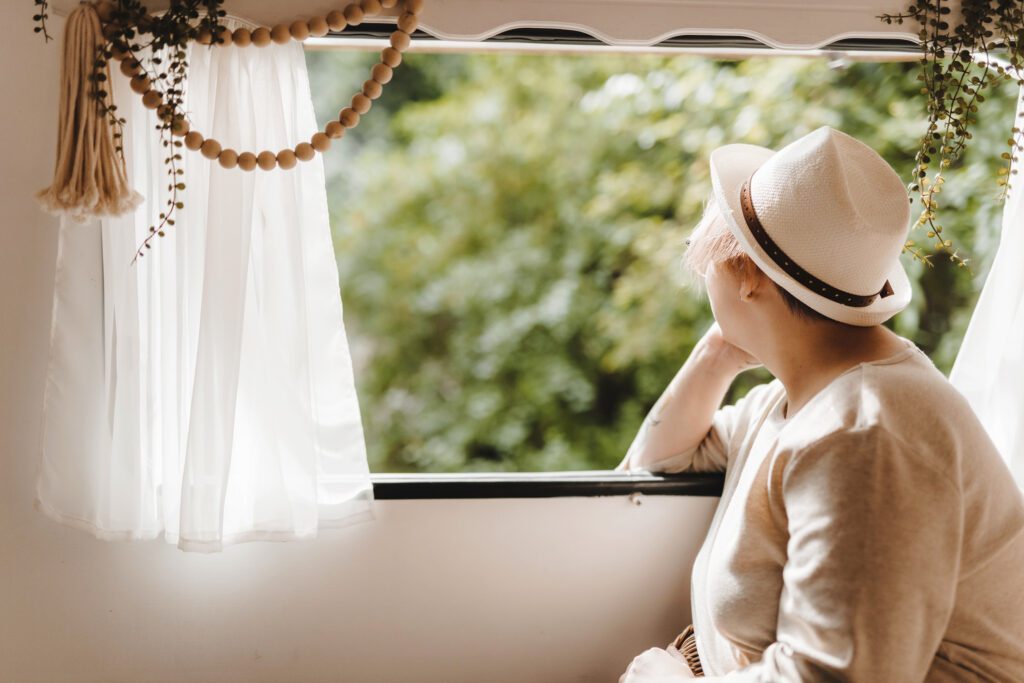 Girl looking out window